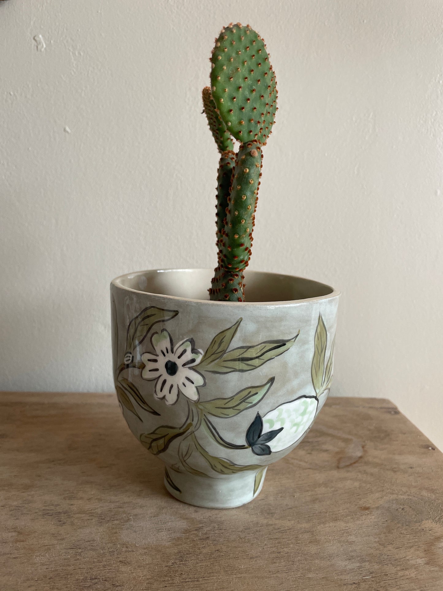 Speckled beige and black striped glazed ceramic jam jar